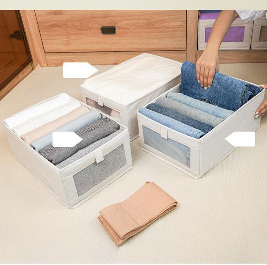 Fabric folding storage compartment
